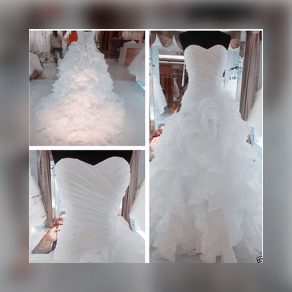Dropped waiste ruffled wedding dress